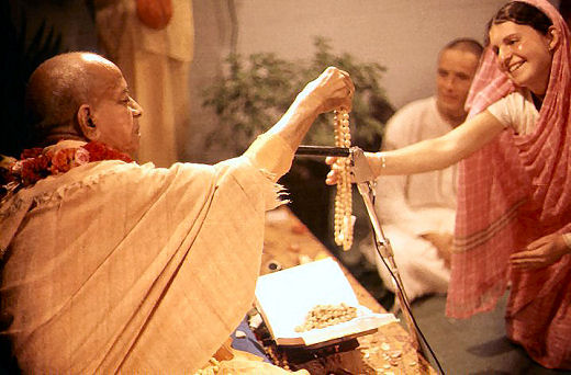 Srila Prabhupada gives initiation to his disciples