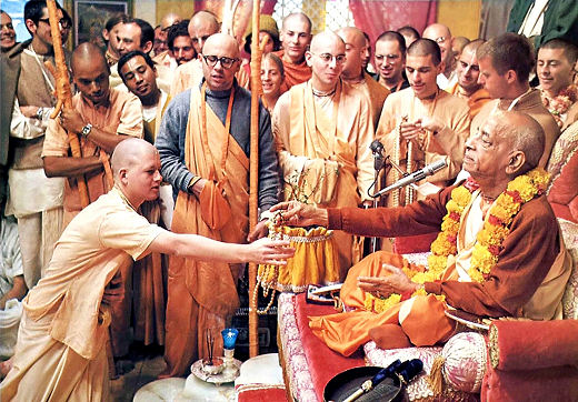 Srila Prabhupada gives initiation to his disciples
